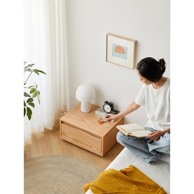Elias Low Bedside Table - 17 - White room, minimalist decor, natural light, wooden furniture, white curtains, green plant