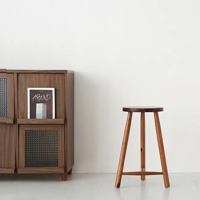 Vezzo Counter Stool - 6 - Wooden cabinet with glass doors, minimalist design, light wooden floor, small round stool, modern