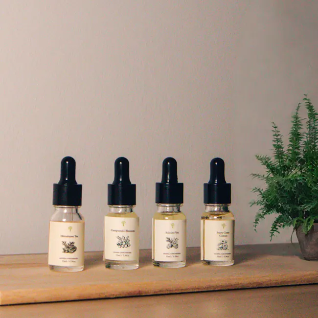 Pristine Aroma Concentrate 10ml - 4 Signature Series Bundle Pack (+ Free Humidifier) - 3 - Four small, clear bottles with