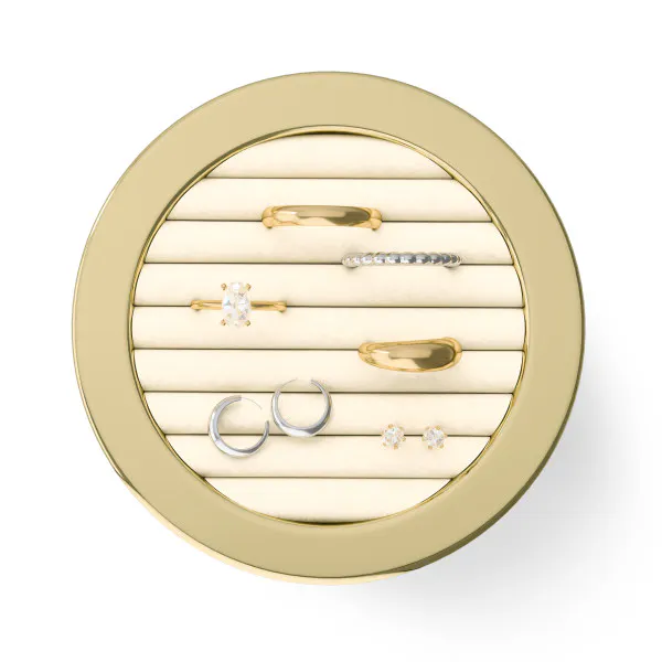 Material and/or texture close-up of Tini Ring Holder - Brass