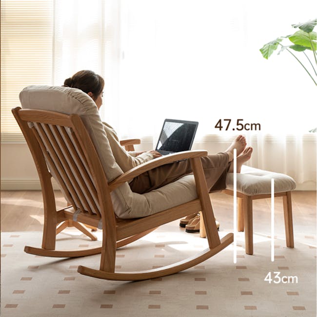 Kusa Rocking Lounge Chair with Ottoman - 16 - Wooden rocking chair, woman sitting, laptop on chair, comfortable seating