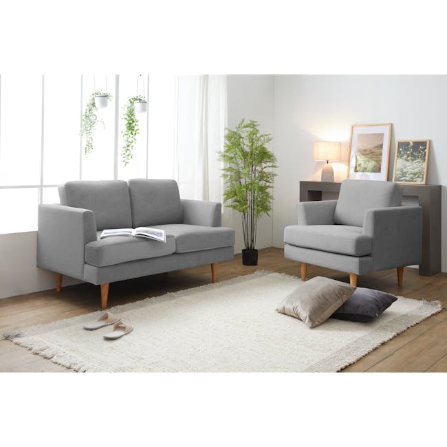 Soma Armchair - Grey (Scratch Resistant) - 3 - Grey sofa, light wooden legs, open book, light-colored slippers, cozy room