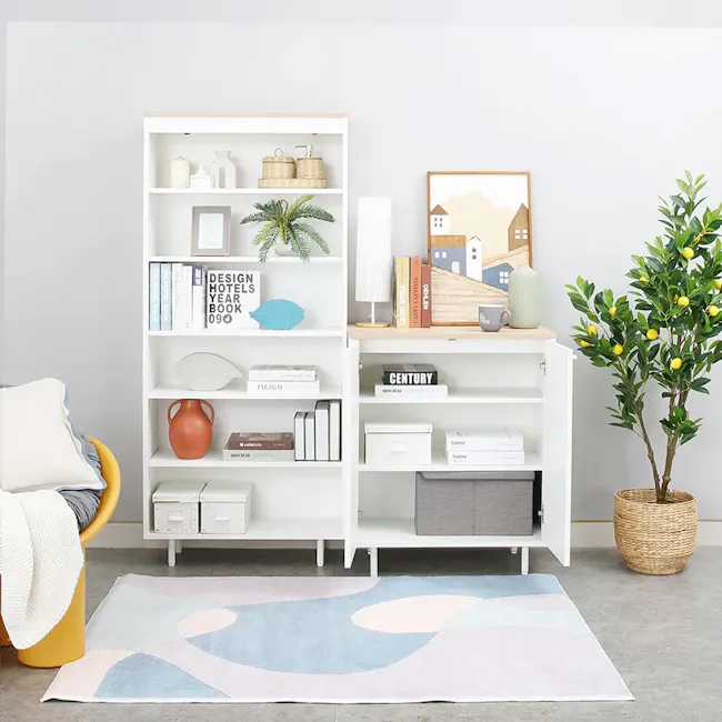 Madeline Open Shelf 0.7m - 12 - White bookshelf, modern decor, minimalist design, colorful rug, cozy corner, indoor plants
