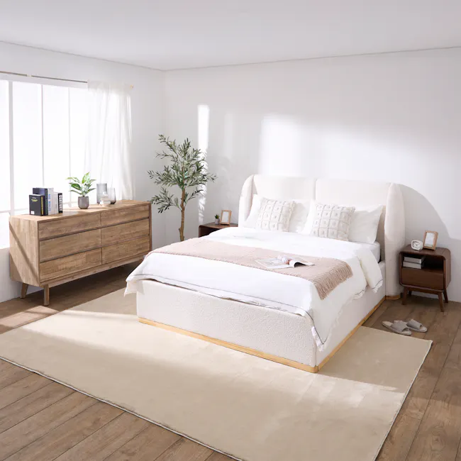 Nova Queen Storage Bed - White Boucle - 5 - White bedroom with wooden furniture, beige carpet, large window with white