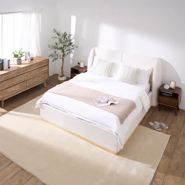 Nova Queen Storage Bed - White Boucle - 18 - White bedroom with modern decor, wooden dresser, beige rug, white bed with
