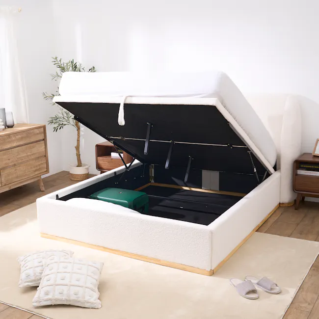 Nova Queen Storage Bed - White Boucle - 3 - White mattress with black frame, green storage box, wooden dresser, potted