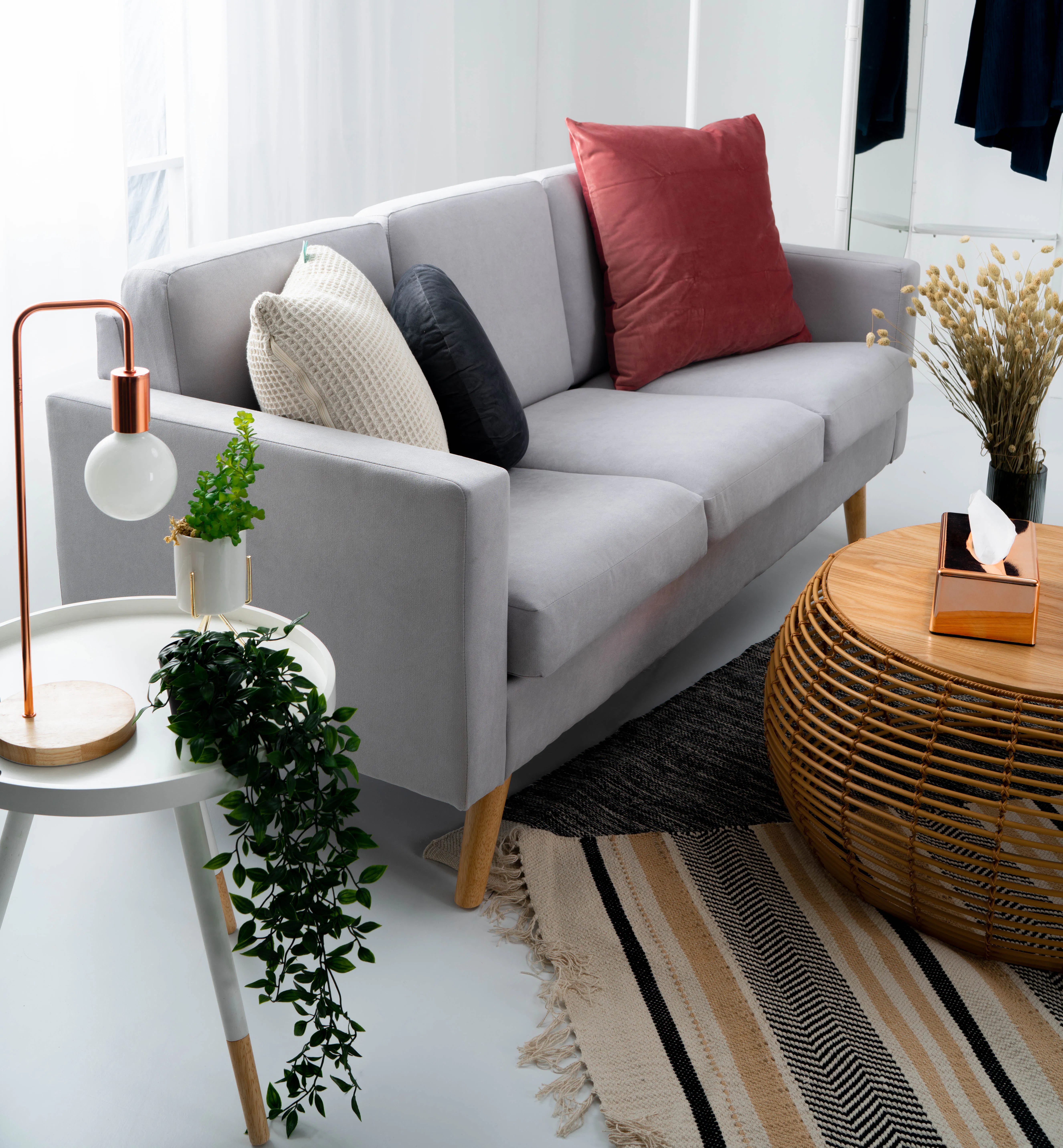 Aiko Queen Bed with Innis Side Table in White - 11 - Modern living room, minimalist decor, gray sofa, red accent pillow