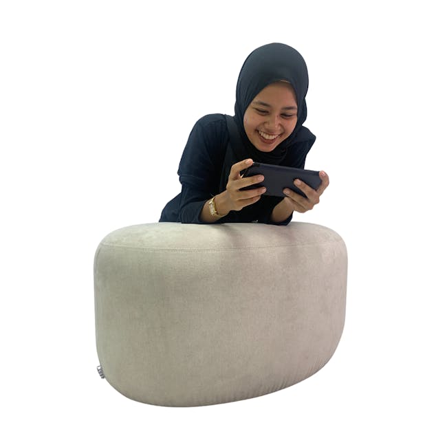 Pebble Ottoman - Thunder (2 Sizes) - 8 - black hijab, woman smiling, holding tablet, modern design, comfortable seating