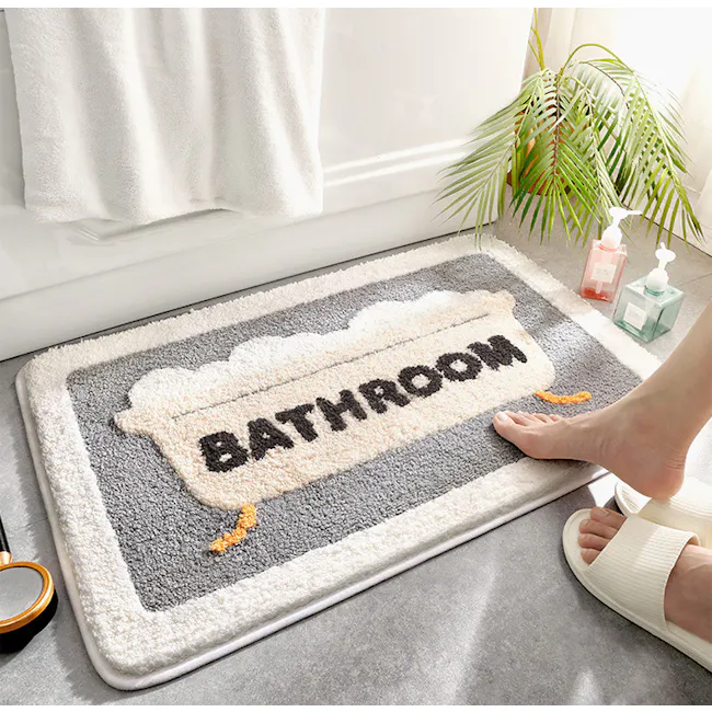Toby Bath Mat - Bathtub - 2 - Bath mat, bathroom, rug, footprints, sandals, white towel, green plants, bathroom essentials