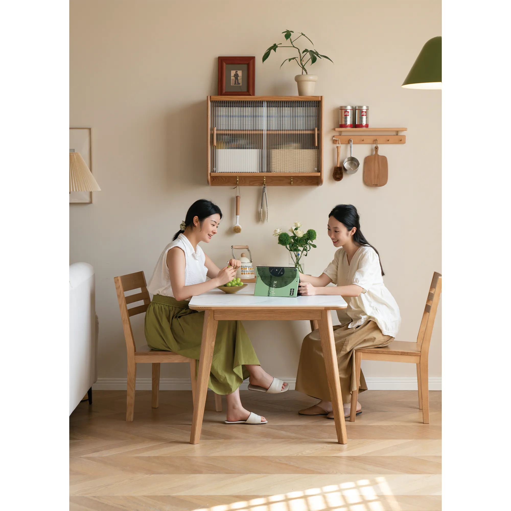 Nellie Dining Table 1.4m - Oak (Sintered Stone) - 11 - Modern kitchen, cozy dining room, two women, wooden furniture, green