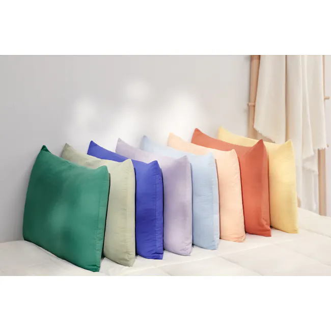 Bodyluv Addiction Cotton Ball Pillowcase - Butter - 8 - Colorful pillows on bed, soft lighting, white wall, geometric