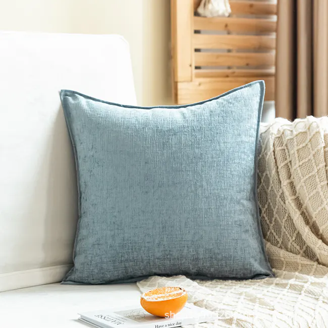 Lucy Cushion - Iceberg - 4 - Light blue textured pillow, cozy couch, natural light, soft cushions, white and beige knit