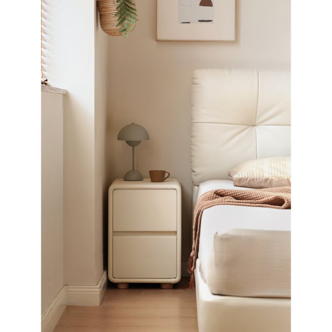 Nolan King Storage Bed in Silver Fox with 2 Asher Narrow Bedside Table - 15 - White bedside table with gray lamp, brown mug