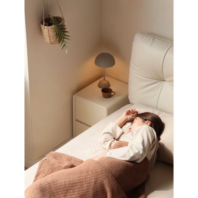 Nolan King Storage Bed in Silver Fox with 2 Asher Narrow Bedside Table - 18 - Soft, cozy bedroom scene, woman sleeping