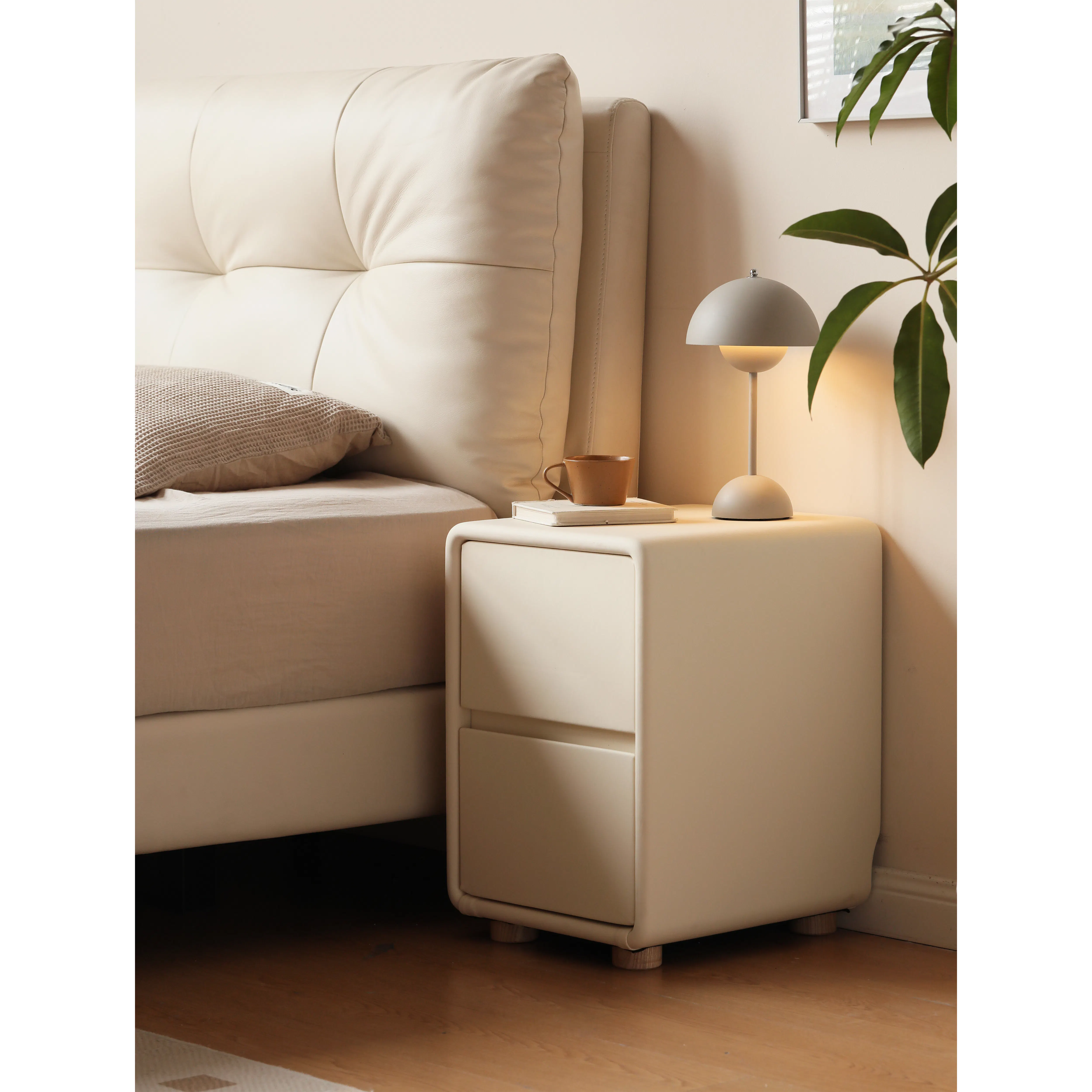 Nolan Queen Storage Bed in Oatmeal with 2 Asher Narrow Bedside Table - 15 - Cream sofa, beige cushions, wooden floor