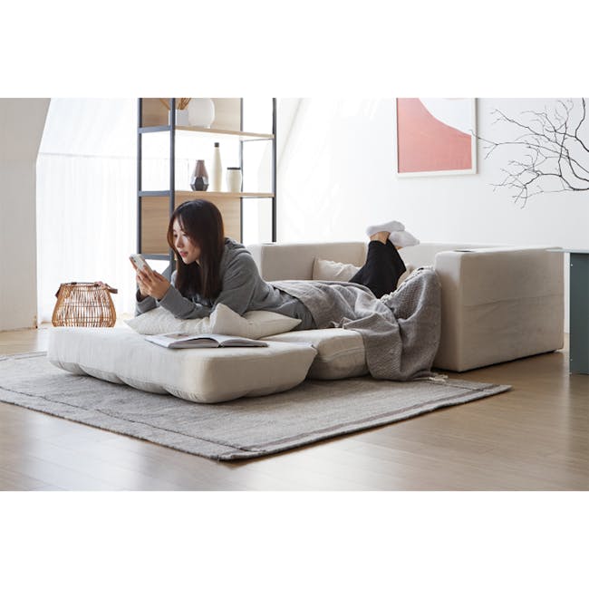 Holmes 3 Seater Sofa Bed - Ivory (Eco Clean Fabric) - 10 - Modern minimalist living room, cozy sofa, soft beige rug, natural