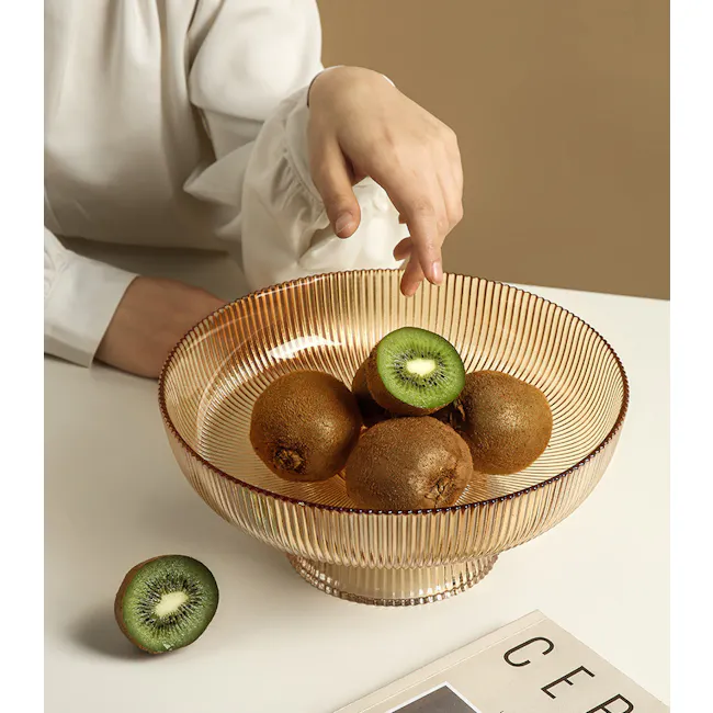 Reagan Glass Display Bowl - Amber - Large - 5 - Golden bowl, kiwi slices, natural light, elegant design, minimalist setting