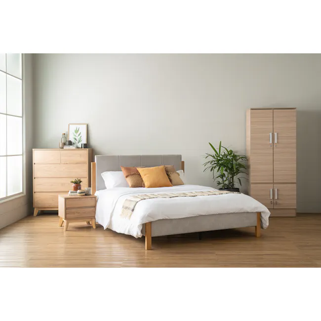 Mayer Queen Bed - Light Grey - 3 - Wooden nightstand, beige bed, wooden dresser, white bedding, orange pillows, brown