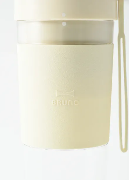 BRUNO Cordless Blender - Pink - 12 - Creamy, soft, pastel, light yellow, matte finish, textured surface, elegant design