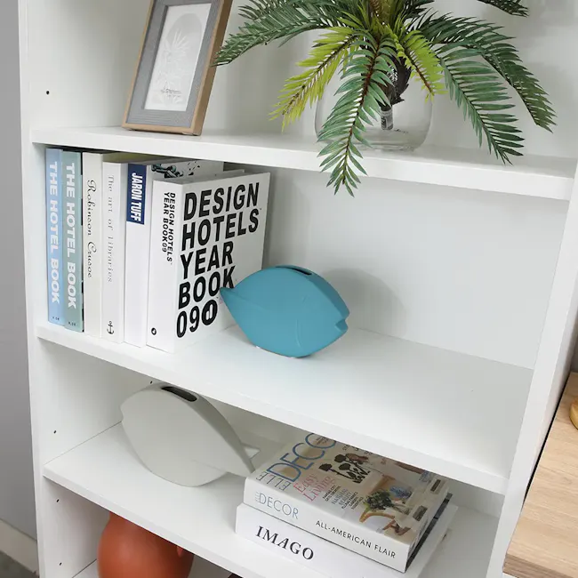 Madeline Open Shelf 0.7m - 10 - White bookshelf, neatly organized, modern decor, books titled "The Hotel Book, " "JAROB
