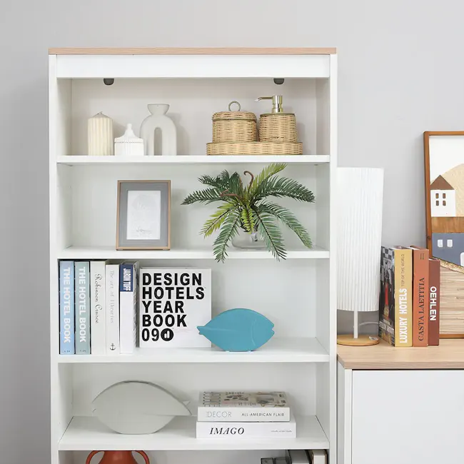 Madeline Open Shelf 0.7m - 7 - White bookshelf, minimalist design, decorative items, framed art, tropical plant, books