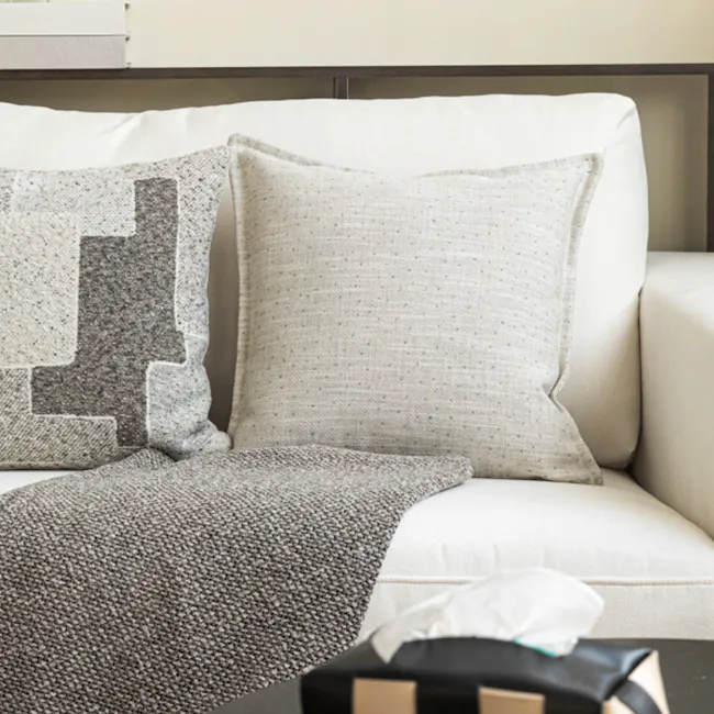 Gregori Linen Specks Cushion Cover - Grey - 3 - Cream and gray textured pillows, white sofa, cozy blanket, modern decor