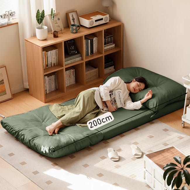 Jesse Sofa Bed - Forest Corduroy - 2 - Green bed with cushion, 200cm size, person sleeping, indoor setting, modern
