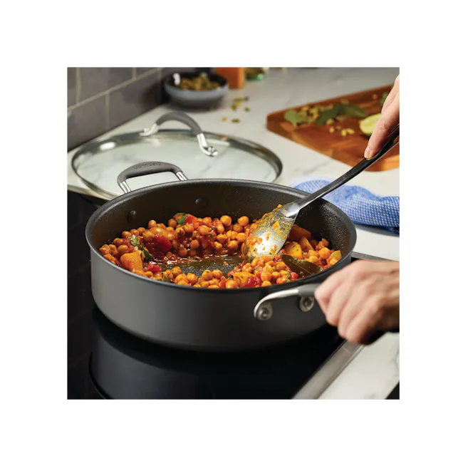 Circulon ScratchDefense A1 Covered Saute with Helper Handle - 10 - chickpeas, cooking, pot, stove, black skillet, hand