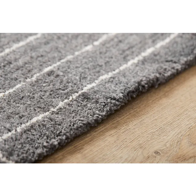 Fjord High Pile Rug - Dark Symmetry (2 Sizes) - 4 - Soft gray shag rug with white stripes, close-up view, cozy living room