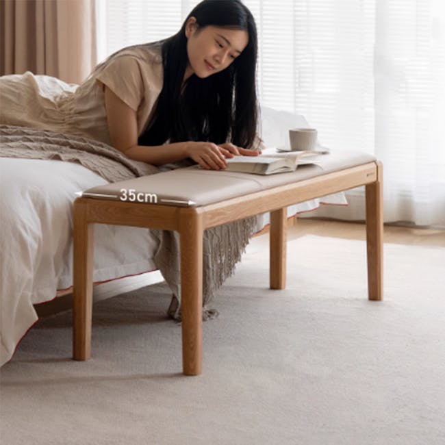 Frank Bench 1.4m - Grey (Faux Leather) - 2 - Luxurious bed, woman reading, cozy atmosphere, light-colored sheets, wooden