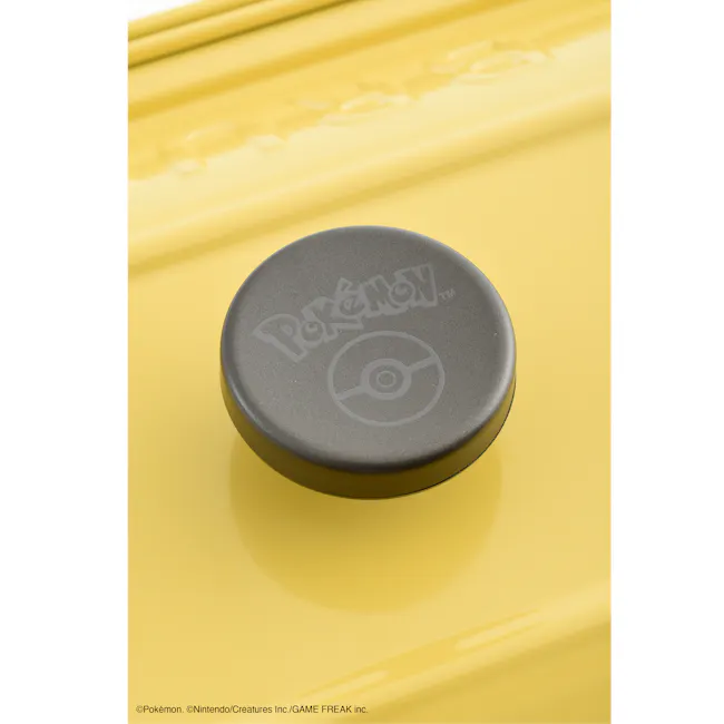 BRUNO Pokémon Compact Hot Plate - 3 - Pokémon logo, Nintendo branding, yellow background, circular design, metallic gray