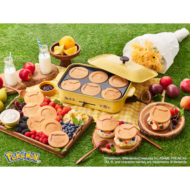 BRUNO Pokémon Compact Hot Plate - 15 - Milk carton, orange slices, lemon wedges, wooden bowl, yellow container