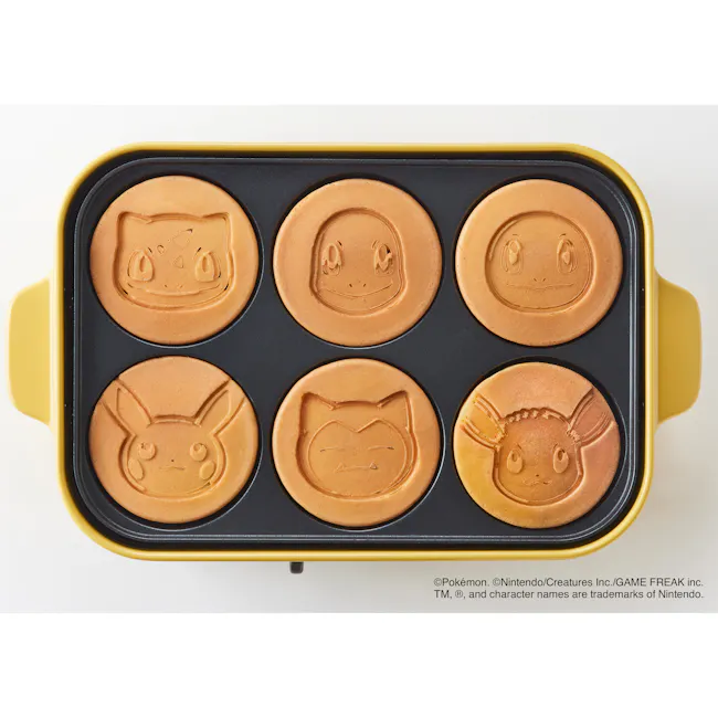 BRUNO Pokémon Compact Hot Plate - 12 - Mint-colored, embossed, cute, cartoonish, face-like, design, Pokémon-themed, yellow