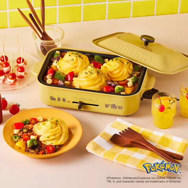 BRUNO Pokémon Compact Hot Plate - 14 - yummy meal, vibrant colors, food preparation, yellow dish, broccoli, tomatoes