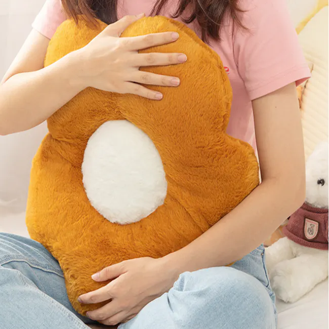 Daisy Plush Cushion - Ochre - 2 - Soft, plush, orange teddy bear, cuddling, pink shirt, light blue jeans, cozy, warm