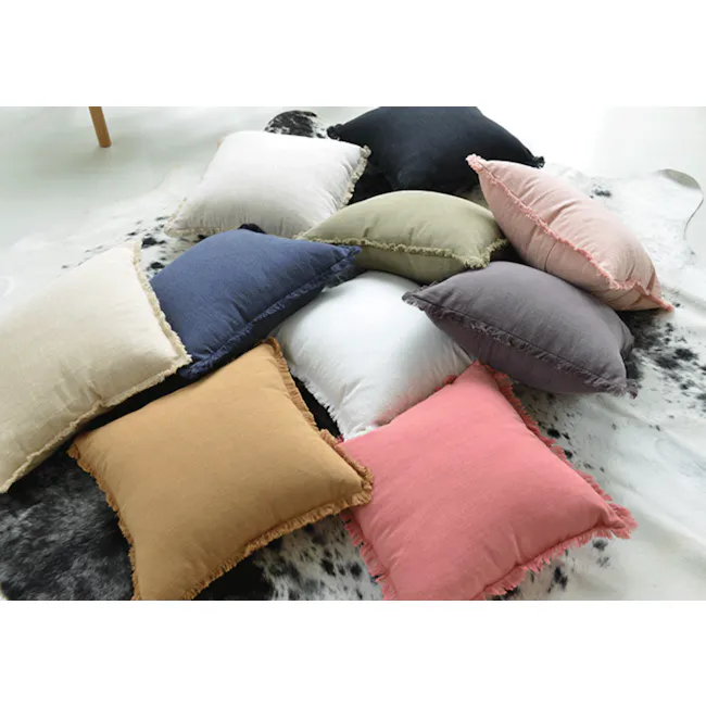 Scylla Fringe Cushion Cover - White - 5 - Soft, cushioned pillows in various colors and textures arranged on a black and