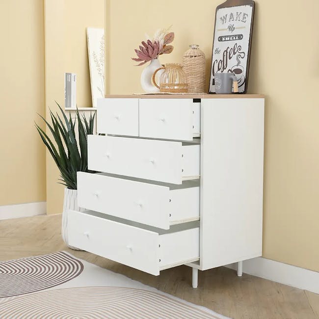 Madeline Modular 5 Drawer Chest 0.7m - 5 - White minimalist dresser with multiple drawers, beige wall, potted plant