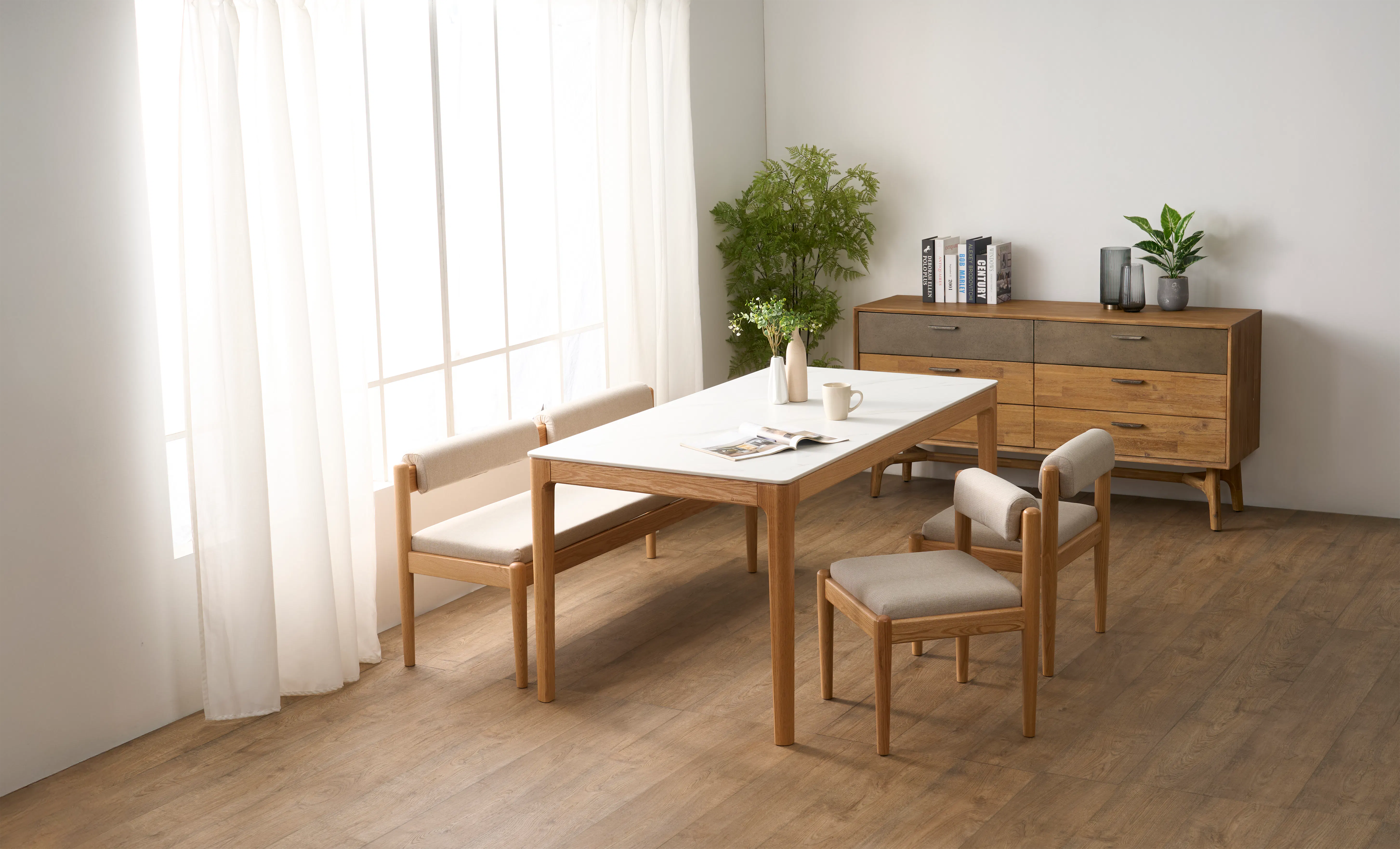 Adelyn Dining Table 1.4m (Sintered Stone) with 2 Niel Chairs and Niel Bench 1.25m in Oak - 51 - Light streaming through