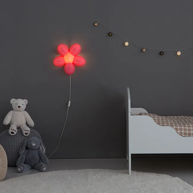 Kids Blossom Flower Wall Lamp - 2 - Floral light fixture, teddy bear, bunny, string lights, gray wall, white bed, plaid