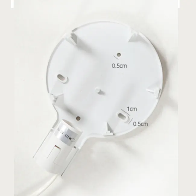 Kids Blossom Flower Wall Lamp - 10 - Circular, white electrical outlet cover, Measuring holes for precise placement