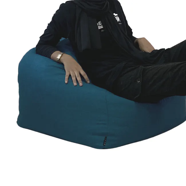 Rey Bean Bag - Blue - 4 - blue bean bag, black outfit, black scarf, gold watch, relaxed pose, casual attire, modern style