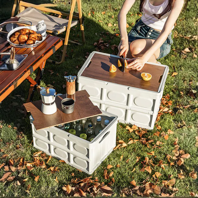 Blake Foldable Storage Box - Ivory - 2 - white cooler, outdoor setting, picnic table, wooden tray, orange slices, woman