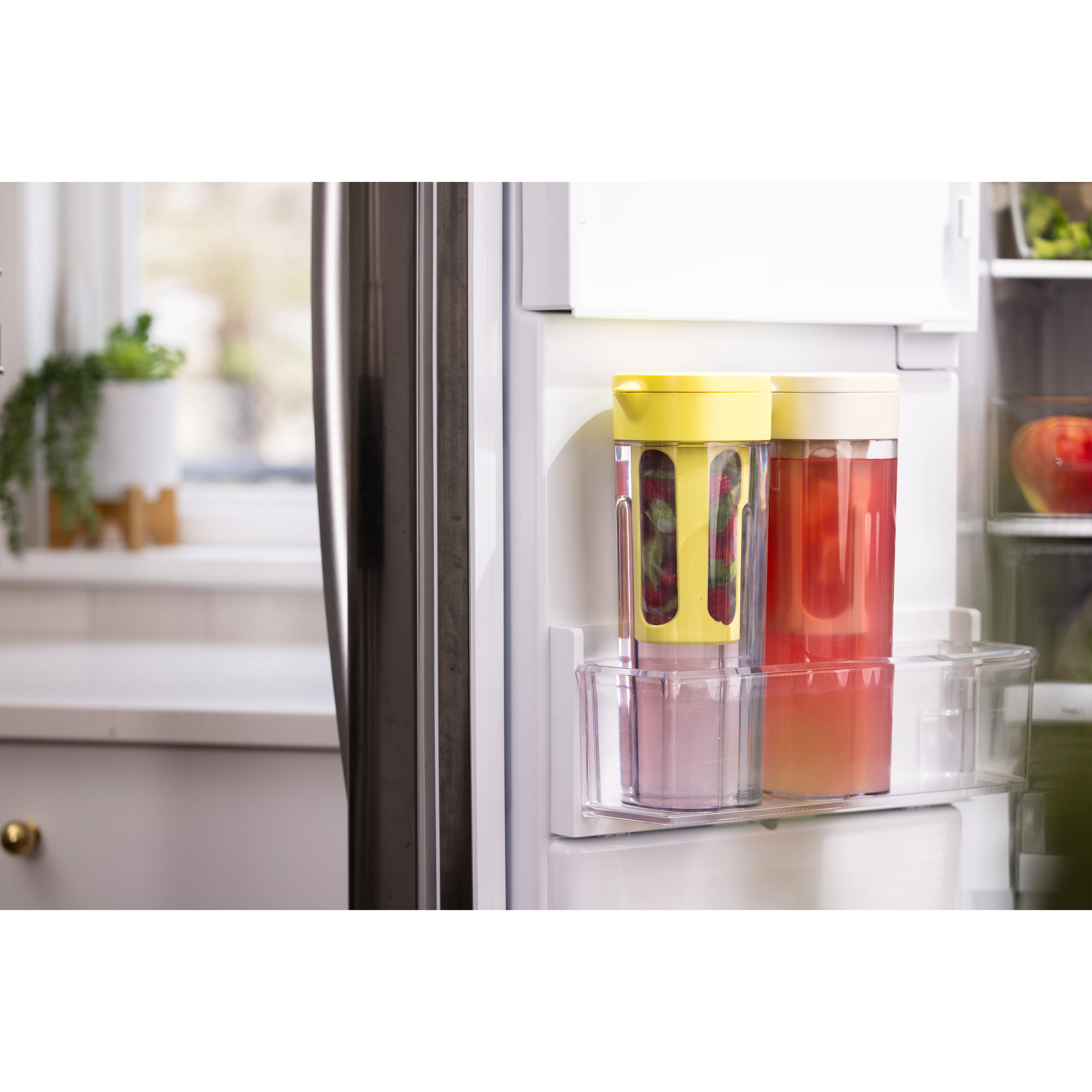 Zuutii Infuser Pitcher - Sakura Pink - 13 - refrigerator, fridge door, transparent container, yellow lid, red liquid, green