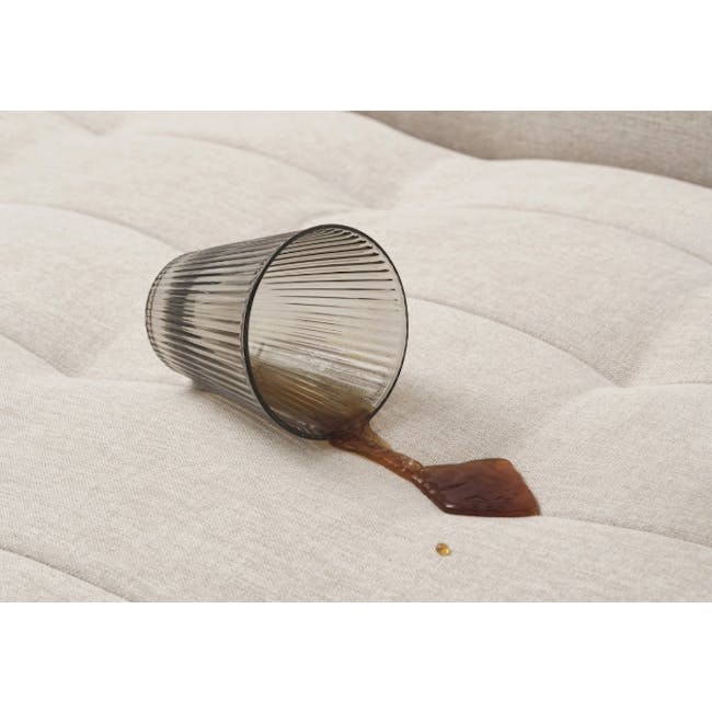 Tessa Storage Lounge Sofa Bed - Beige (Eco Clean Fabric) - 15 - Glass on cushion, coffee spill, brown liquid, coffee stains