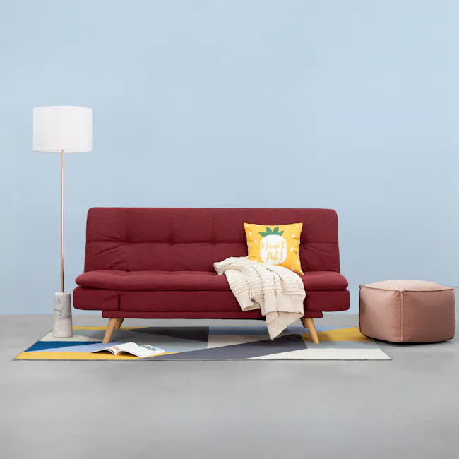 Alyssa Floor Lamp - White, Copper - 6 - Red velvet sofa, yellow pillow with "Huah Ah!" design, beige throw blanket, marble