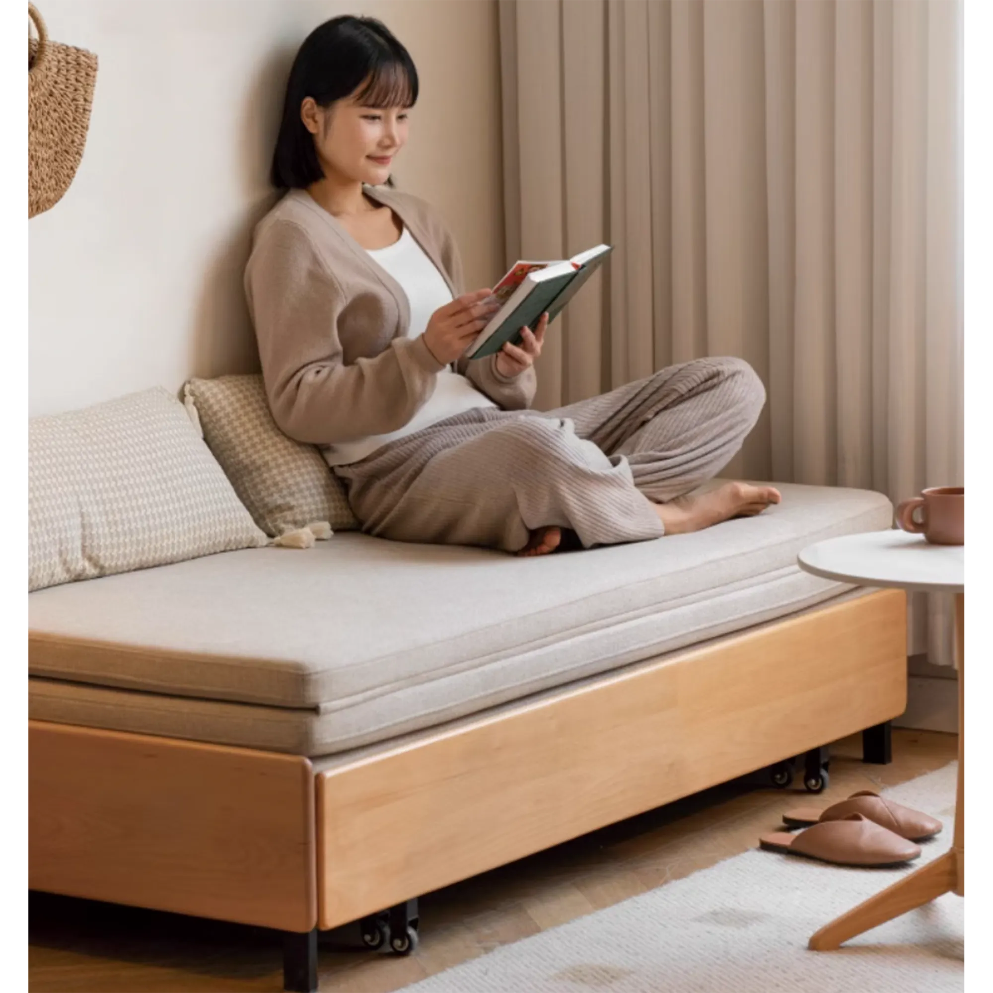 Yoke Sofa Bed / Bench 1.5m - Gravel White - 9 - Sleek modern design, cozy reading nook, woman comfortably seated, light