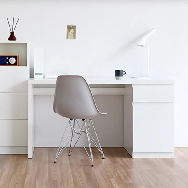 Flando Study Table 1.4m - 3 - White minimalist desk, modern chair, wooden floor, white wall, small framed picture, white