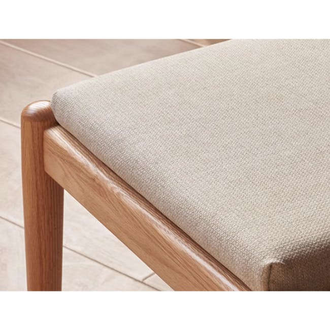Niel Chair - Oak, Gravel White - 9 - Wooden chair with beige cushion, natural wood finish, smooth texture, sturdy