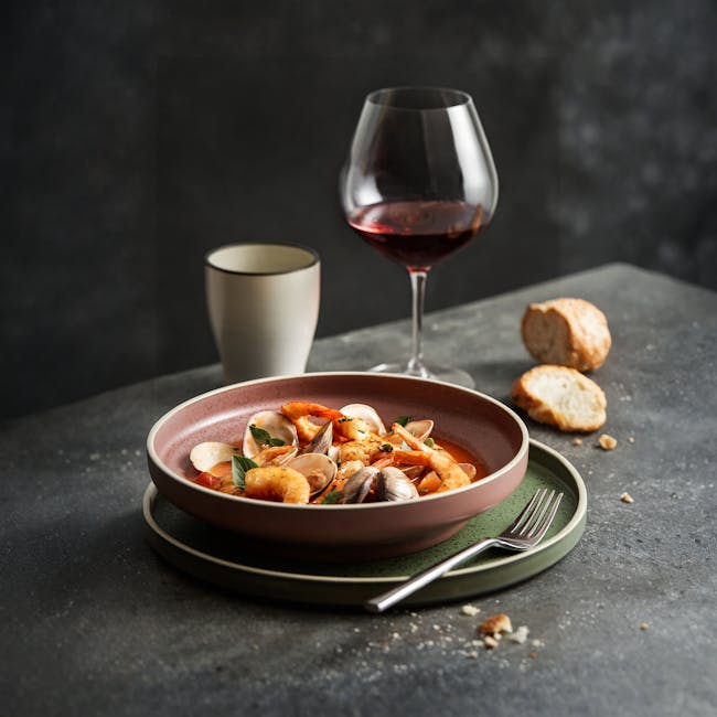 Luzerne Mod Deep Coupe Plate - Smoky Plum (3 Sizes) - 2 - shrimp and clams in a bowl, wine glass, wine glass filled with red