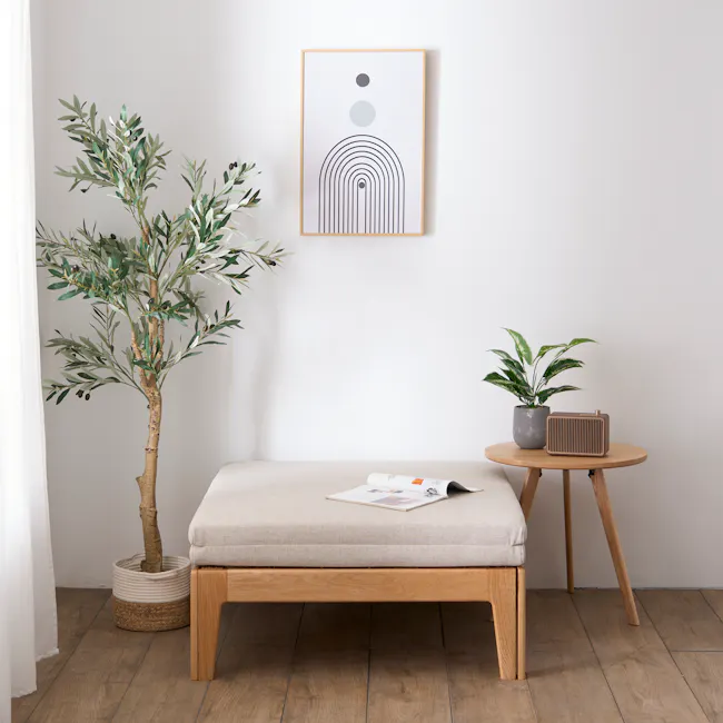 Mariel Lounge Sofa Bed - Gravel White - 4 - Modern minimalist interior, abstract art on white wall, potted plant with green